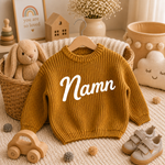 Babytröja djupgul med stickat namn